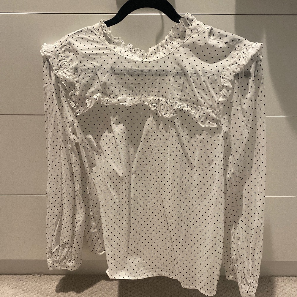 White with black polka dot blouse